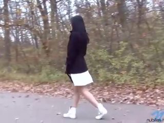 Gorgeous dark haired teen with huge tits pissing outdoor