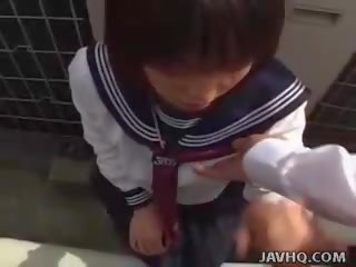 Japanese teen in a schoolgirl outdoor blowjob fun